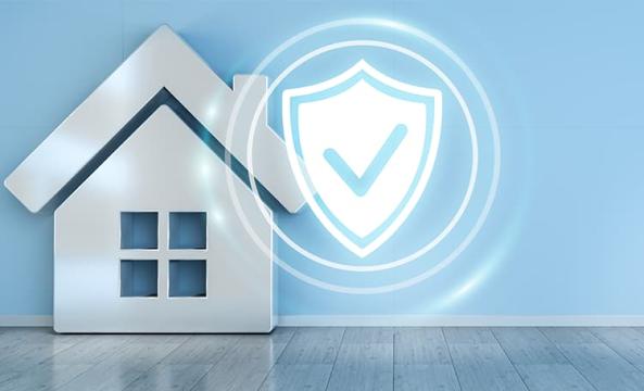 Une maison avec un bouclier de protection 